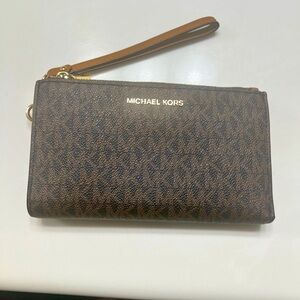Gently used Michael Kors clutch wallet